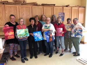 Kathleen Conover teaching a fun group of artists.